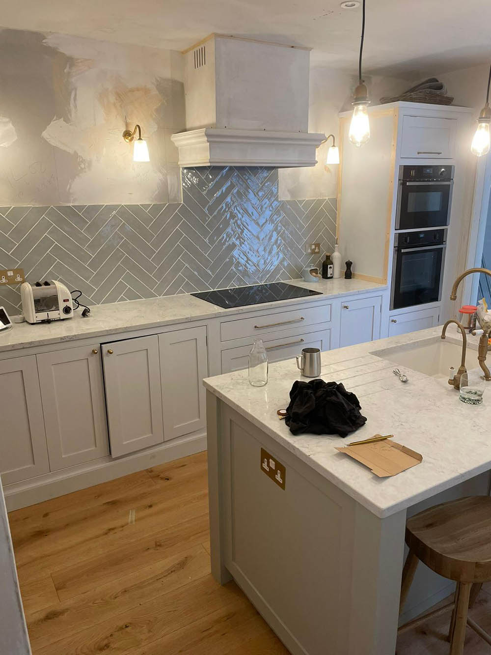 herringbone style backsplash in a kitchen