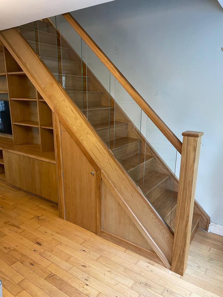 Wooden staircase with storage underneath