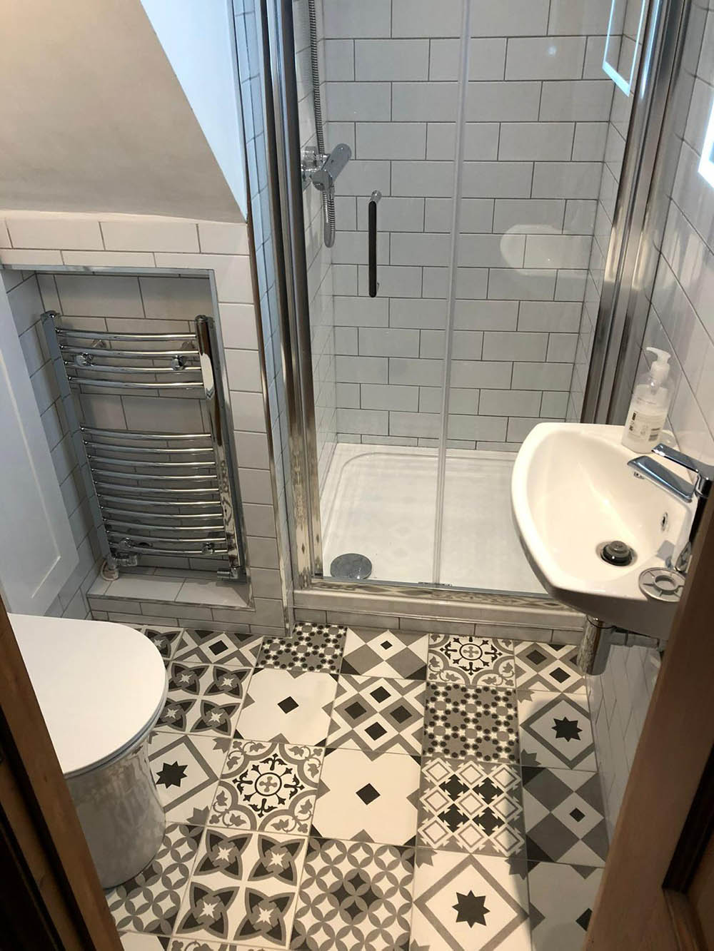 Patterned tile floor of a bathroom